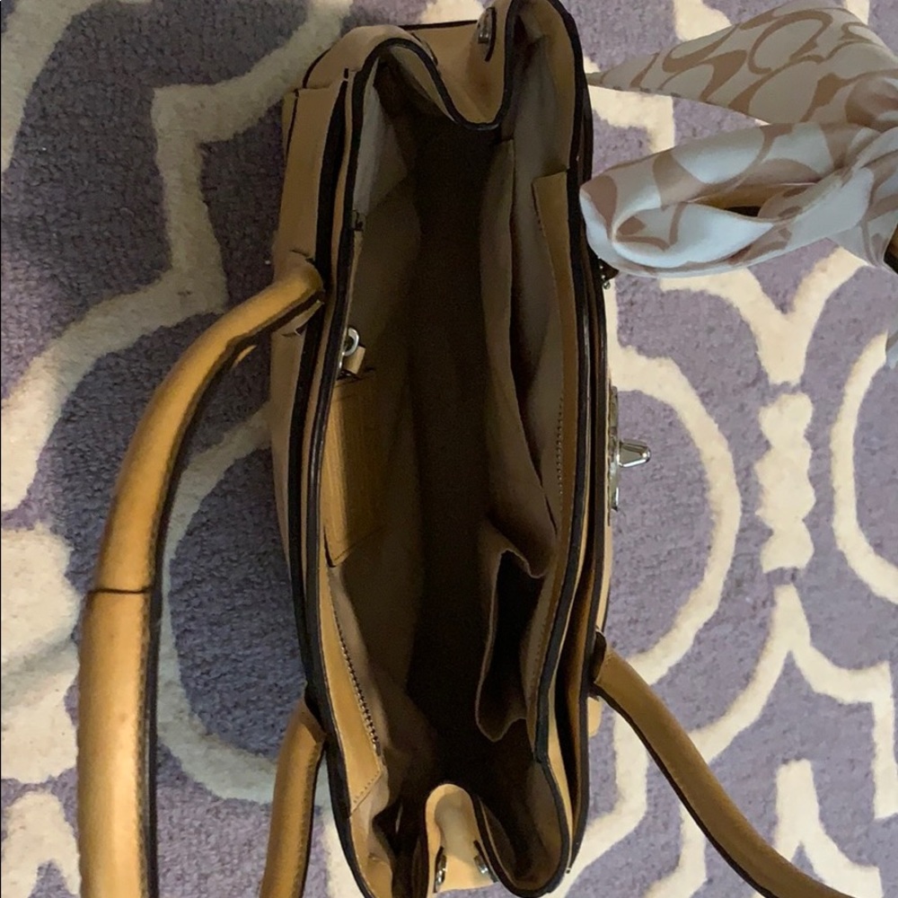 Light tan Coach purse. - Picture 2 of 4